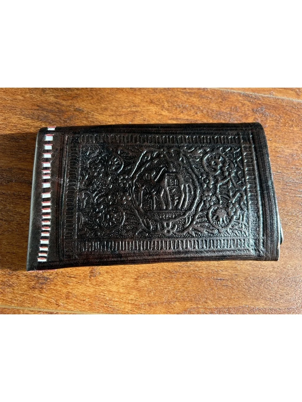 Vintage Embossed Black Leather Wallet with Intricate Design